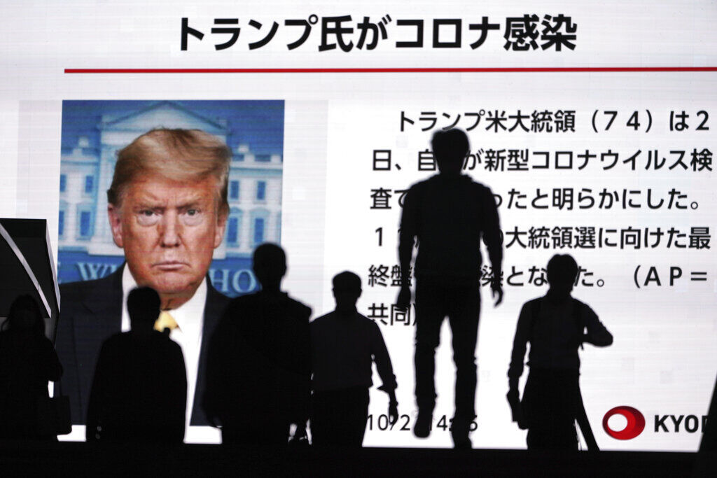 APTOPIX Virus Outbreak Japan Trump Reax